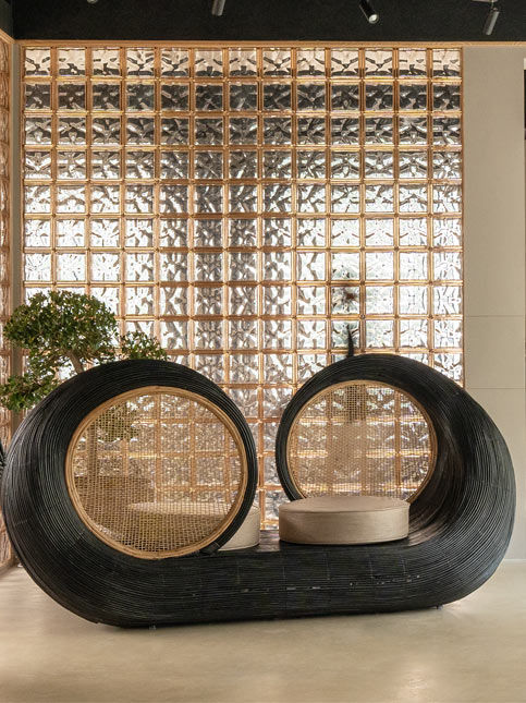 Prana Homes sculptural black wicker love seat – Beautiful Homes