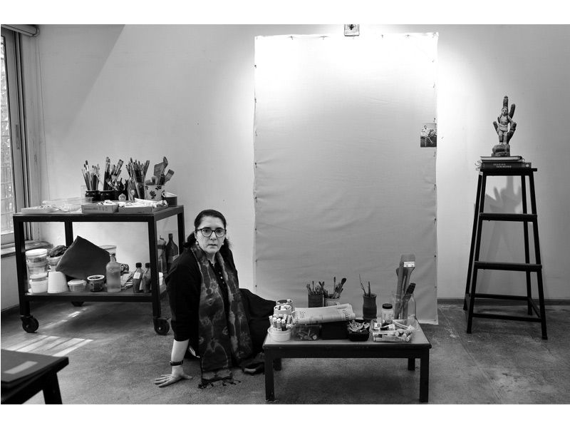 Anju Dodiya in her art studio with a blank canvas and painting tools – Beautiful Homes