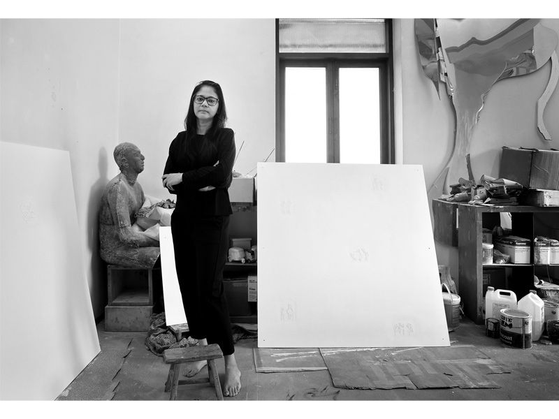 Shilpa Gupta in her studio with a sculpture and blank canvas – Beautiful Homes