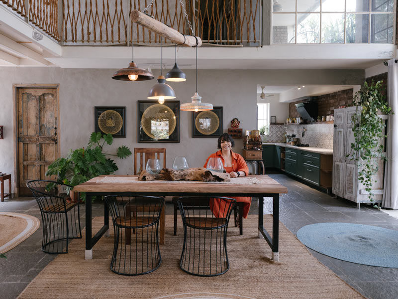Ethnic Indian dining room with rustic wooden table and hanging pendant lights – Beautiful Homes