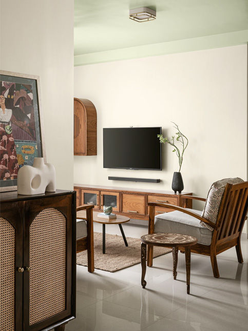 The furniture is custom-designed to suit the space. The interior paints used for the walls and ceiling are from Asian Paints Royale Aspira – Beautiful Homes