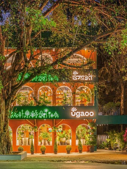 Ugaoo Pune store with terracotta walls and indoor plants - Beautiful Homes