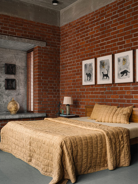 Hilla House by Studio Lagom with feline wall art and Yamini soft furnishings - Beautiful Homes