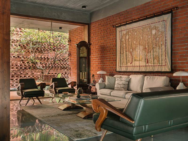 Hilla House by Studio Lagom with Mata ni Pachedi and vintage clock - Beautiful Homes
