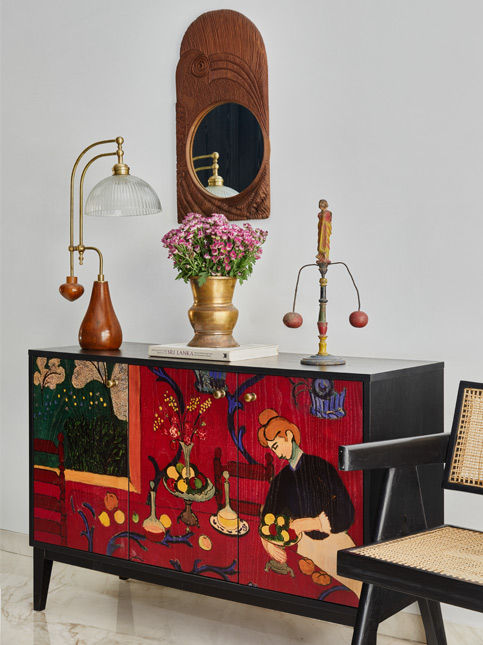 Studio Lagom interior with wooden frame mirror table lamp and console - Beautiful Homes