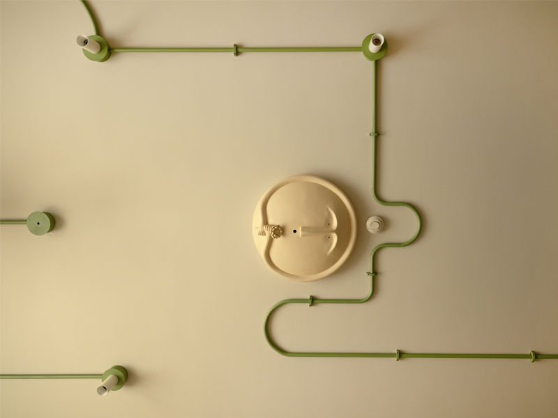 White ceiling with Clayman sculptural piece in Byculla home - Beautiful Homes