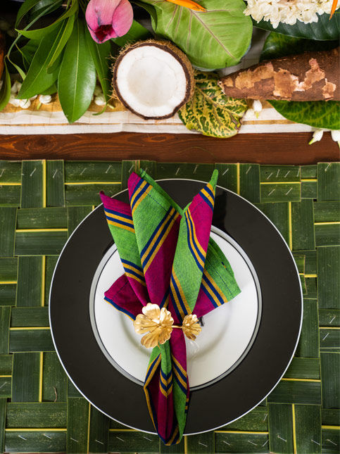 Ceramic plates from Paradise Road, table napkins from MANN by Varsha Menon and a napkin ring from Nicobar - Beautiful Homes