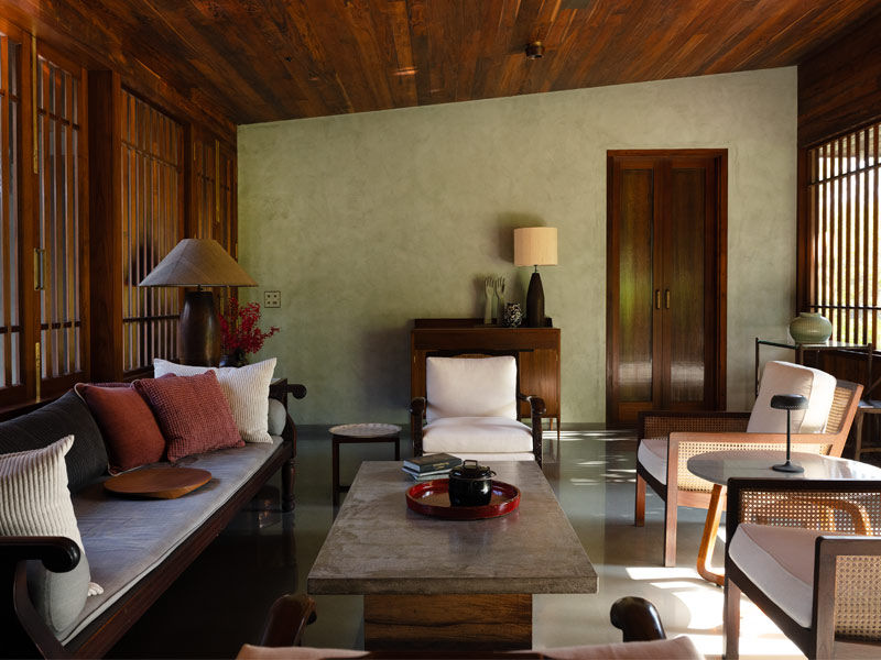 Restored Copper House II living room with timber ceiling and celadon walls - Beautiful Homes