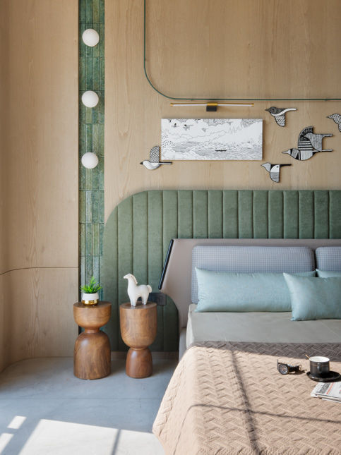 Master bedroom with pastel green accents and neutral palette - Beautiful Homes