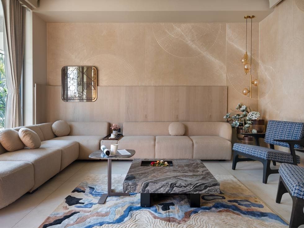 Beige drawing room with marble flooring and colourful upholstery - Beautiful Homes