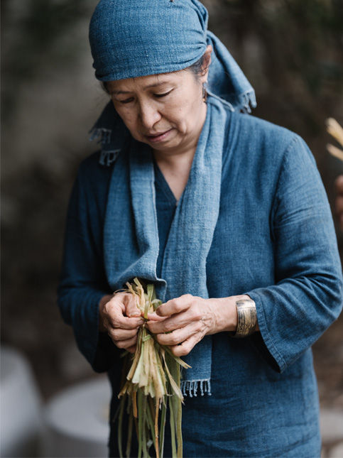 Chiaki Maki holding stripped banana stem fibres - Beautiful Homes