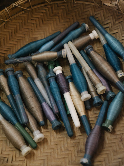 Hand-wound thread spools for studio handlooms at Ganga Maki - Beautiful Homes