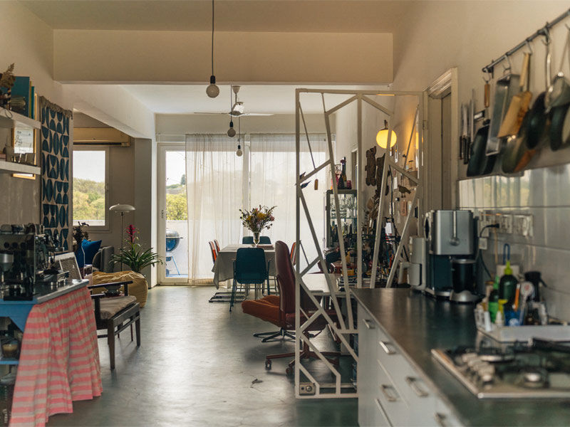 Open kitchen looking into the dining space for the Apartment popup in Bengaluru – Beautiful Homes