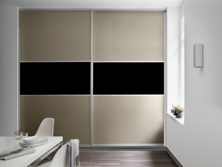 A closed wardrobe with glossy exterior near a table  - Beautiful Homes