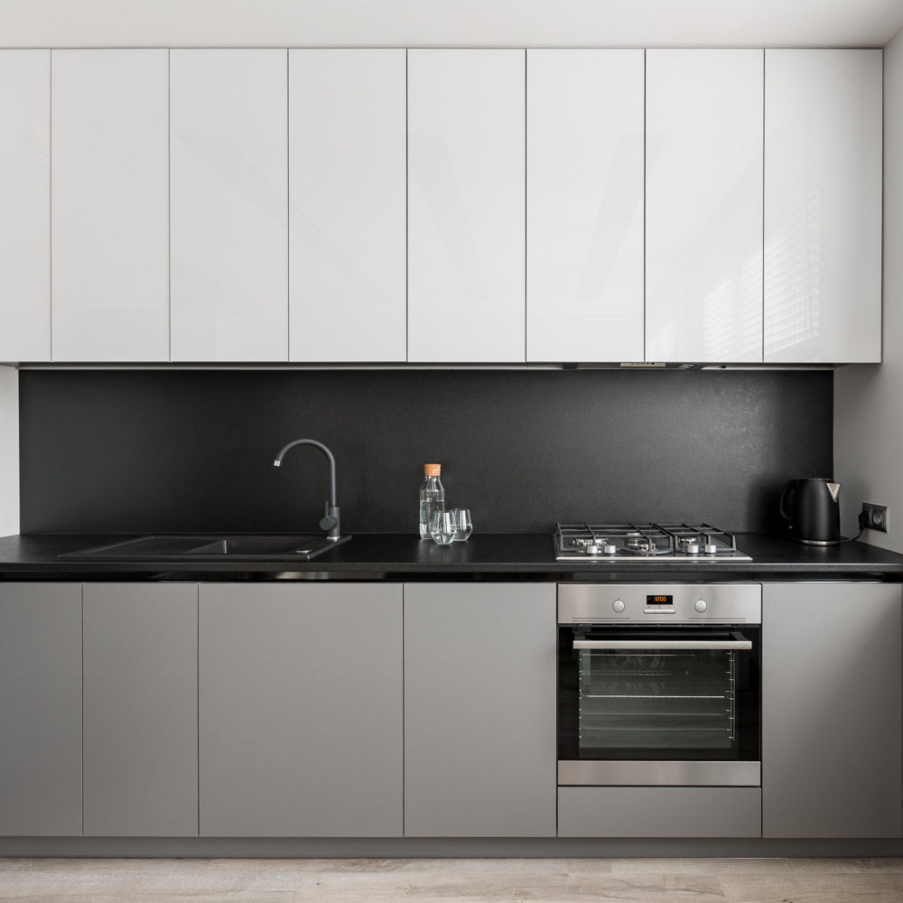 Classic modular kitchen design in black and white colour combination  - Beautiful Homes