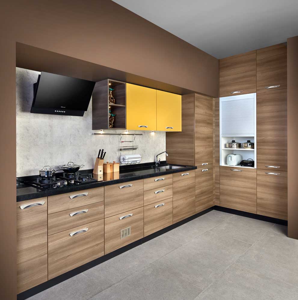 Modular kitchen design with the granite-black countertop and wood panels  - Beautiful Homes