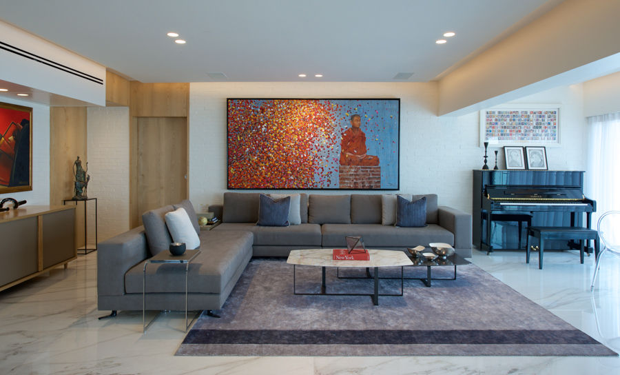 Family room design with art installation and a piano, minimal furniture and lots of empty space