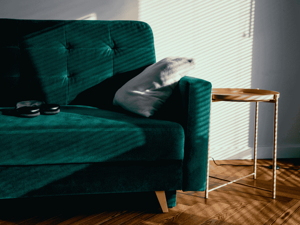Dark Green Tufted Sofa With Pillow And Side Table - Beautiful Homes