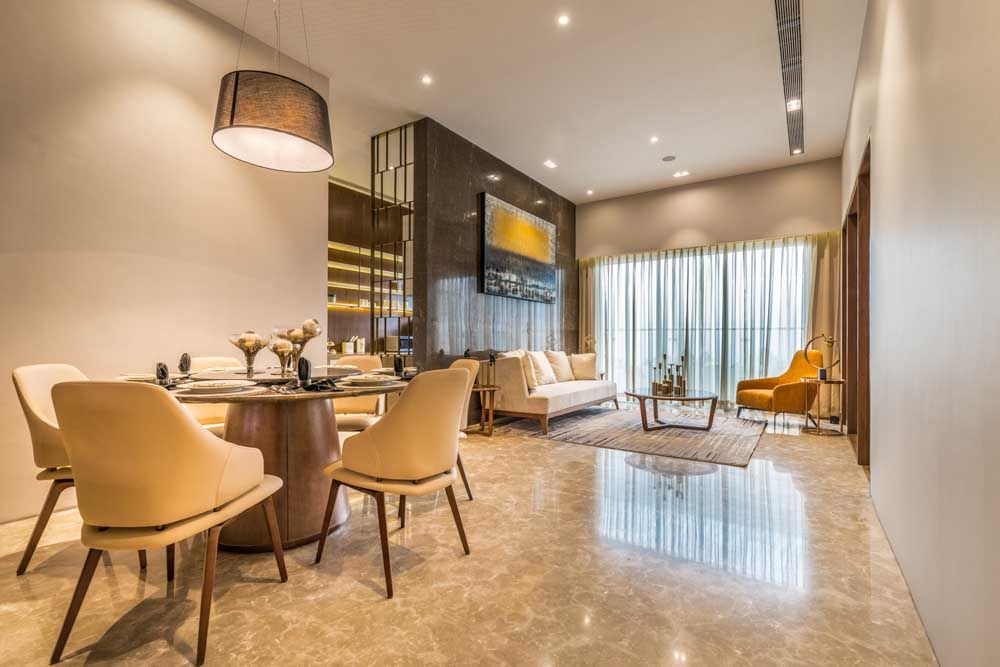 Multipurpose spacious living room design marbles and a sober colour palette  - Beautiful Homes