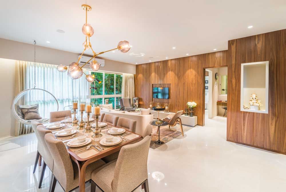 Multipurpose spacious living room design with couch, mix of varied armchairs and a rug - Beautiful Homes