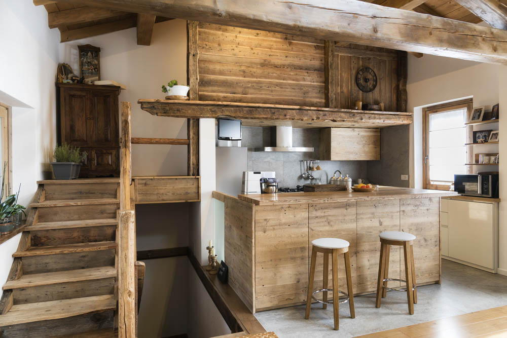 Wooden rustic kitchen cabinet designs with a matching countertop - Beautiful Homes