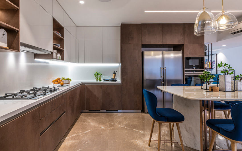 Neat wooden urban kitchen design with marble dining table and a few house plants