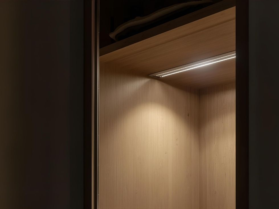 Contemporary wardrobe with cupboard sensor lights - Beautiful Homes