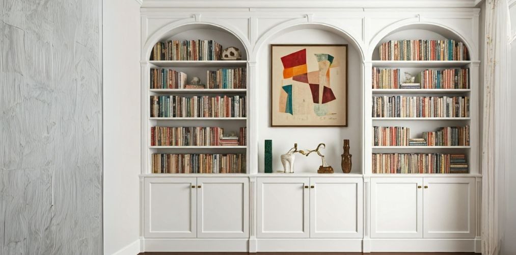 POP arched niches in living room for bookcases - Beautiful Homes