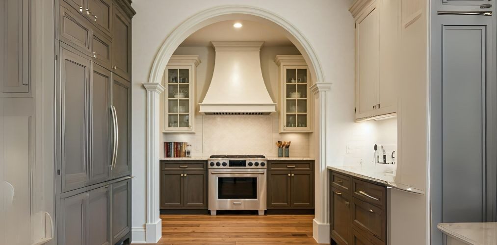 White kitchen arch design with column pillars - Beautiful Homes