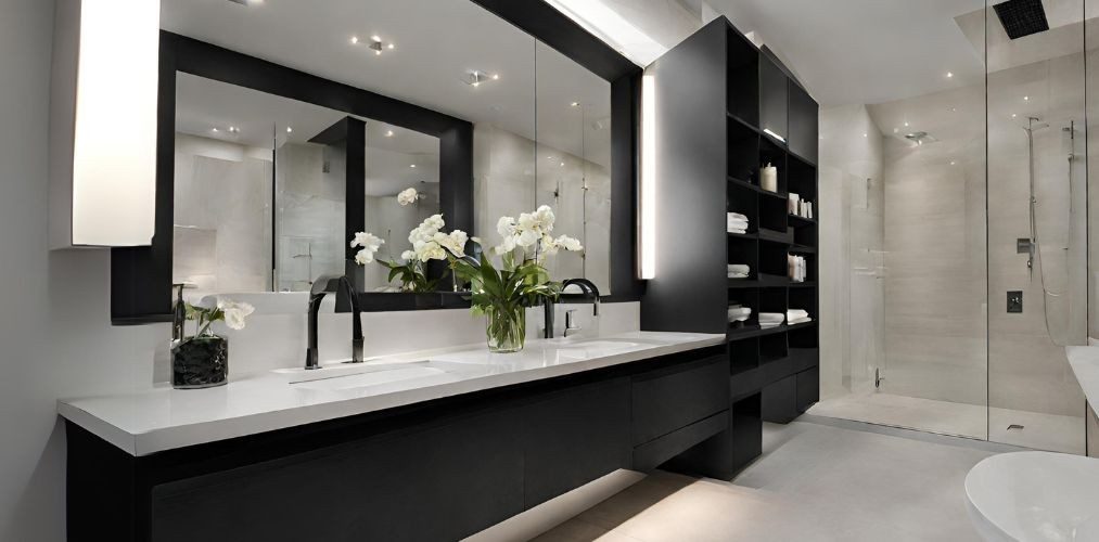 Bathroom with black vanity and bathroom shelves - Beautiful Homes