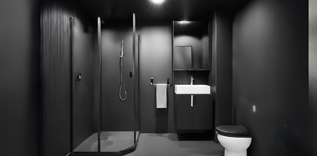 Minimalist black bathroom with white sanitary fittings - Beautiful Homes