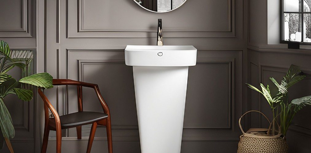 Small powder room with nude tiles and pedestal wash basin-Beautiful Homes