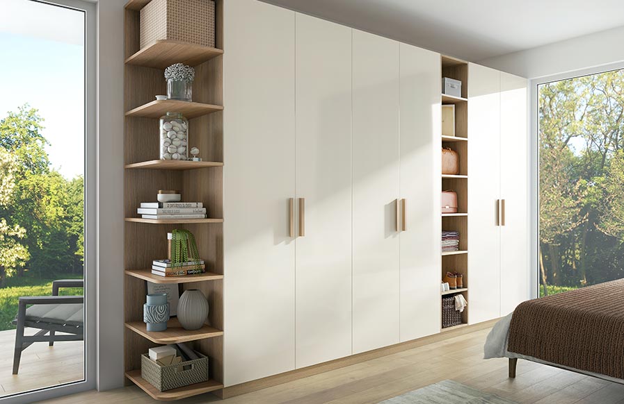 A modern wardrobe design that displays a collection of objects and a three-door wardrobe - Beautiful Homes