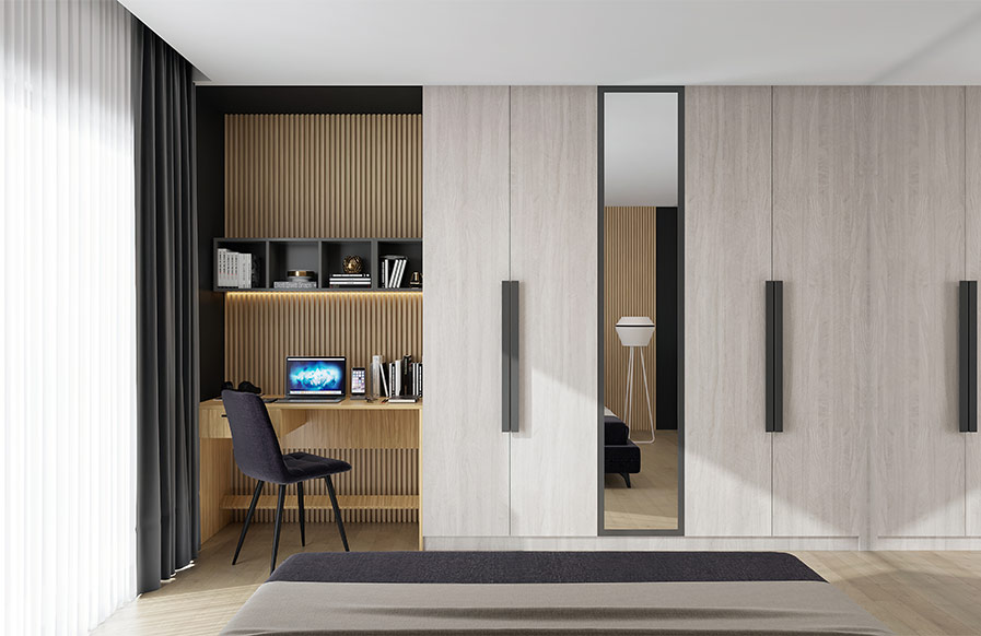 A wardrobe mirror design that doubles as a dresser and study table in a modern bedroom - Beautiful Homes
