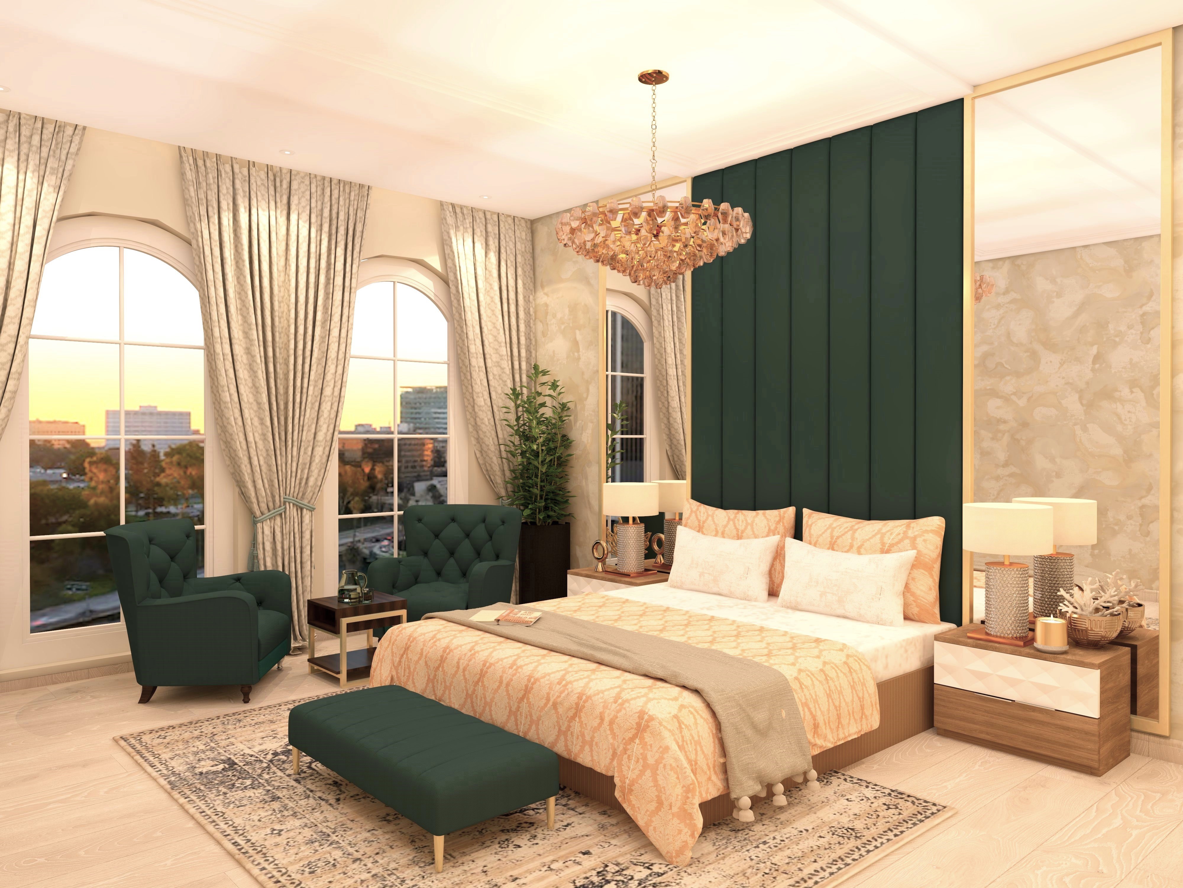 Cream bedroom with green upholstered wall and armchairs-Beautiful Homes