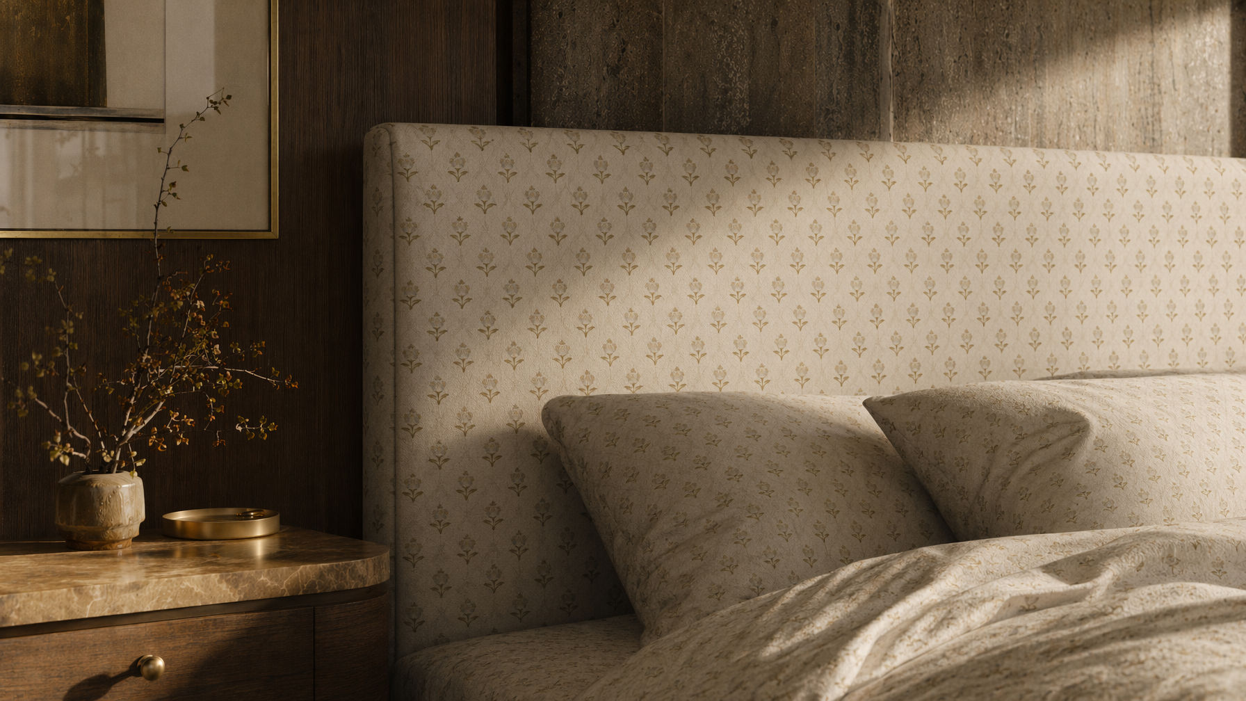 Cream upholstered headboard with a delicate olive floral pattern, coordinated with matching pillows and bedding - Beautiful Homes