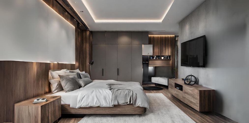 Master bedroom with king size bed and wooden TV unit-Beautiful Homes