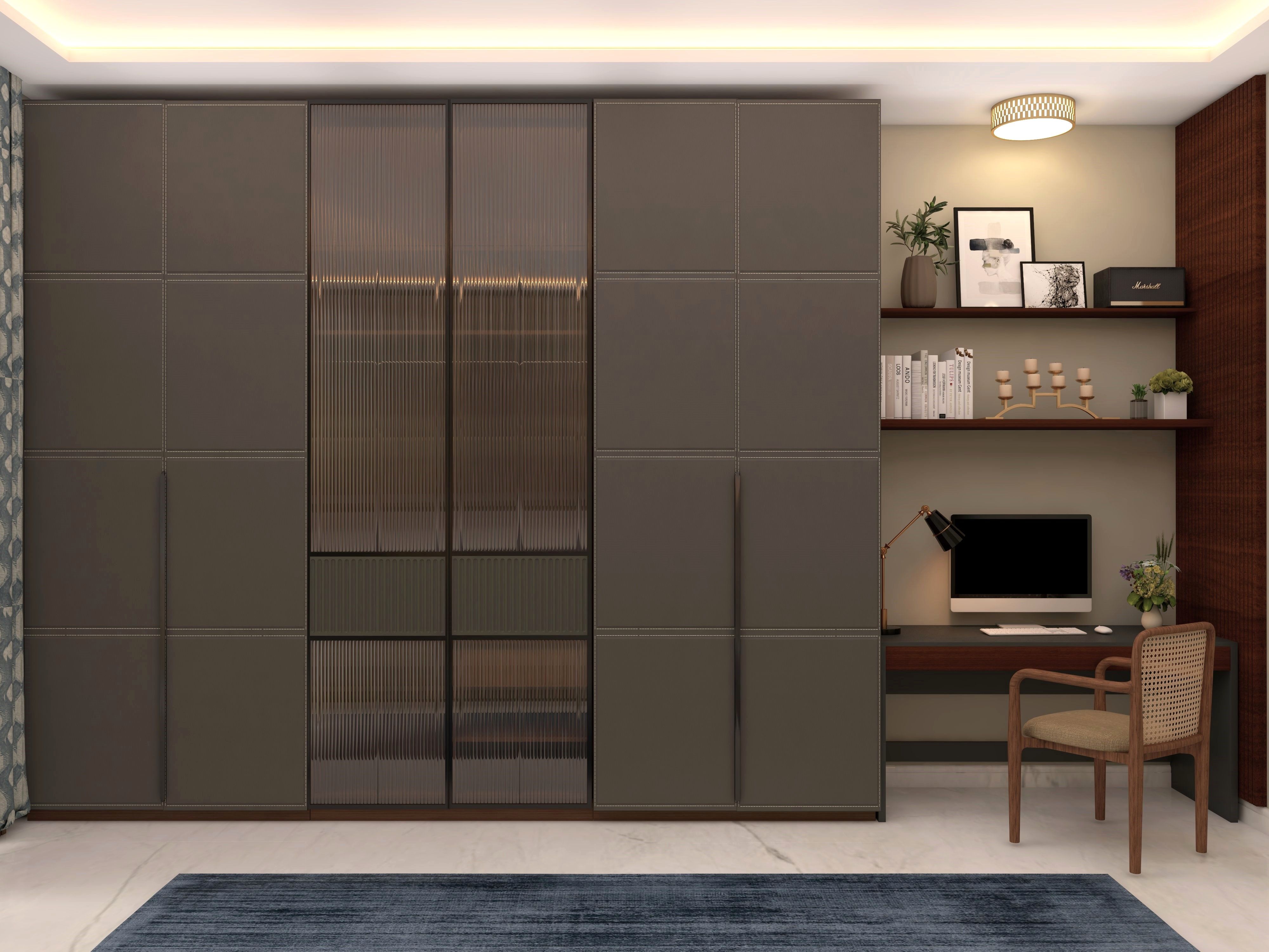 Contemporary room featuring a dark wardrobe, fluted glass doors, and a compact study area - Beautiful Homes