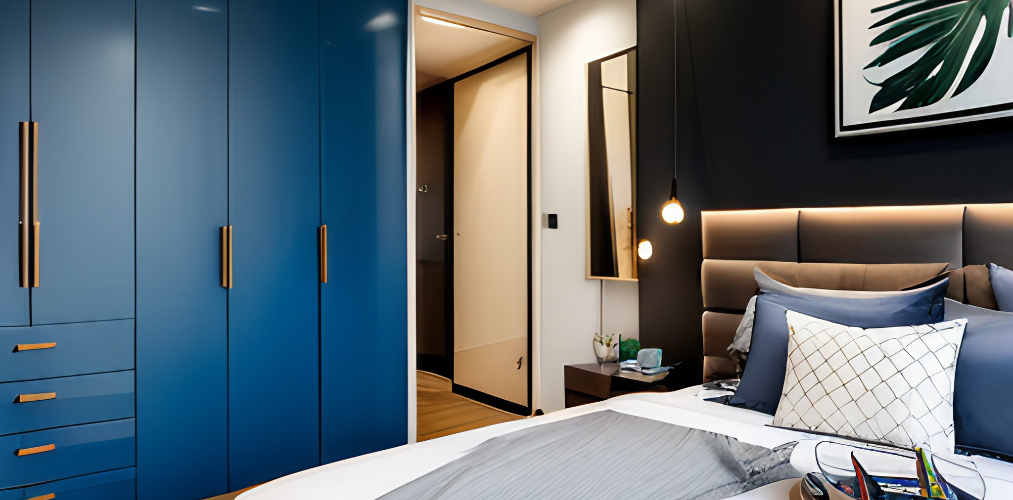 Blue wardrobe design for modern bedroom interiors-Beautiful Homes
