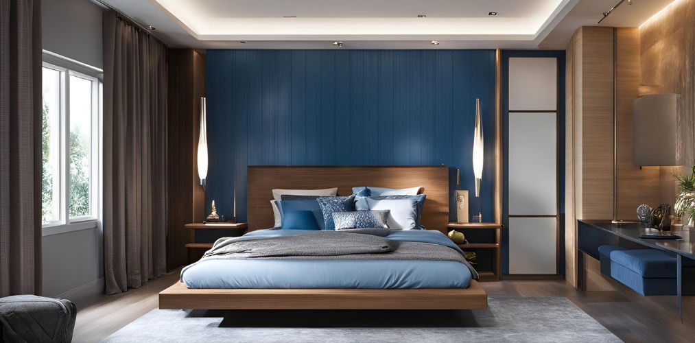 Modern bedroom with king size bed and blue wall paneling - Beautiful Homes