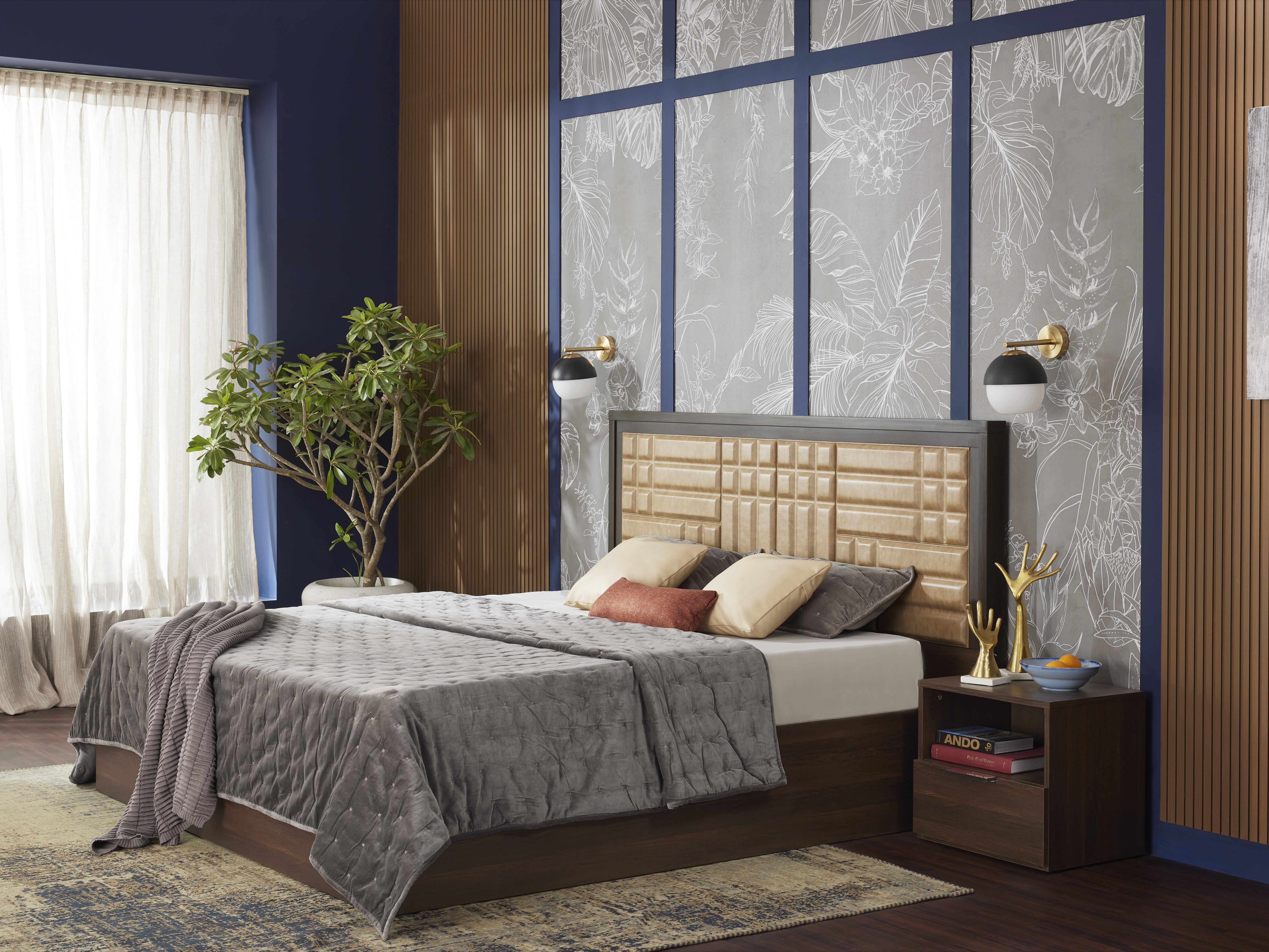 Modern bedroom with grey bed and floral wall design - Beautiful Homes