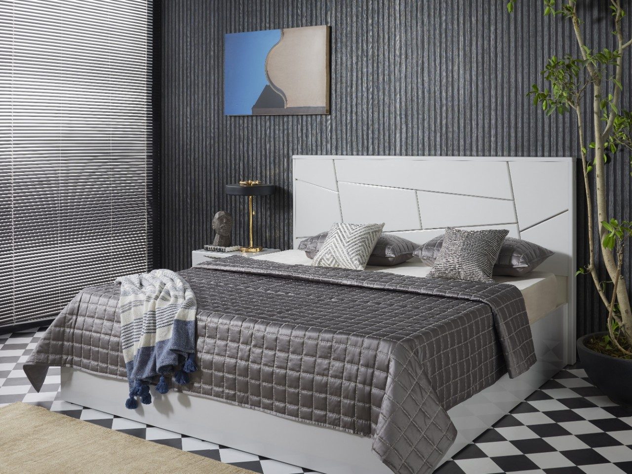 Monochrome bedroom with geometric patterned headboard - Beautiful Homes