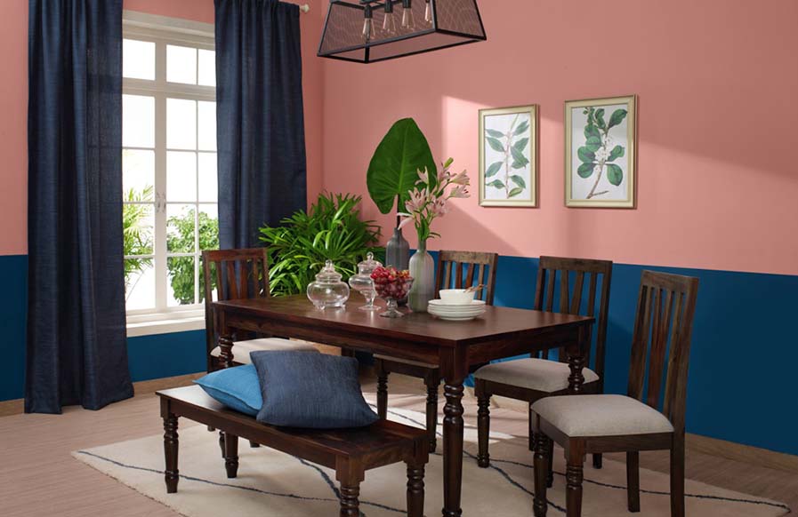 Modern blue & pink dining room design with wooden dining table set - Beautiful Homes