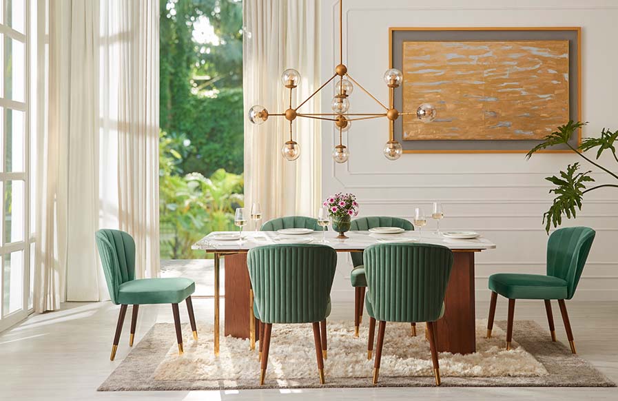 Luxurious dining room design with velvet furnishing & a luxe chandelier - Beautiful Homes
