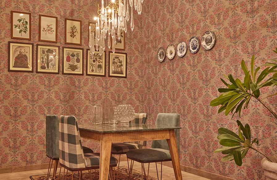 Small Indian dining room design with traditional wallpaper for the wall - Beautiful Homes
