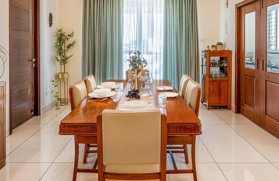 Pastel coloured dining room design with wooden furniture - Beautiful Homes