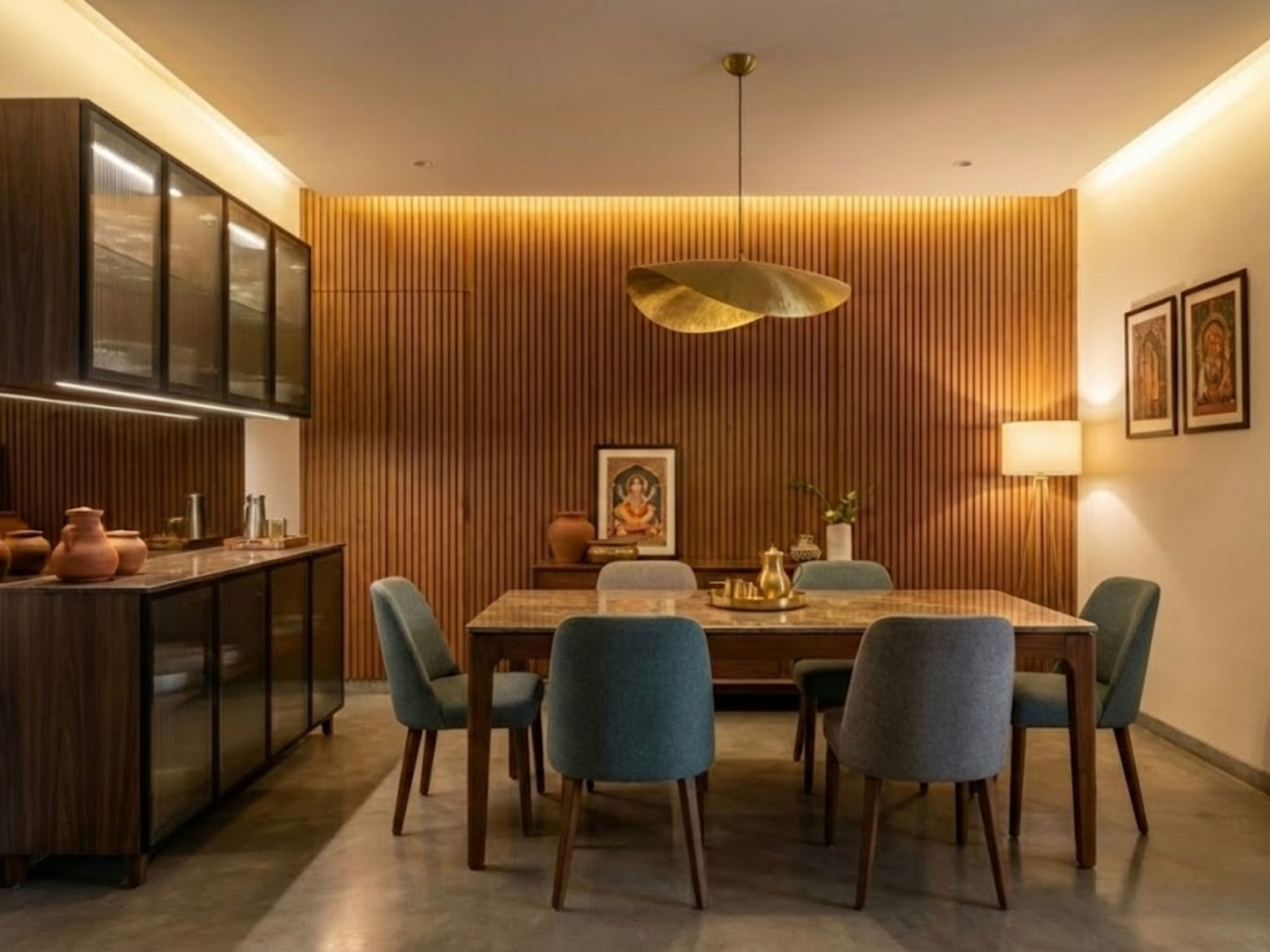 Dining room with blue chairs and marble table - Beautiful Homes
