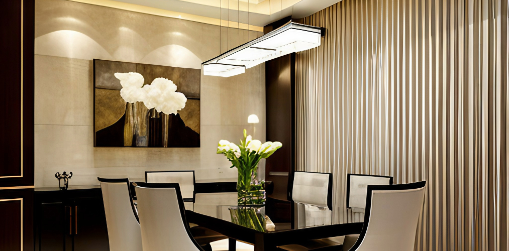 Beige dining room with hanging lights and wallpaper-Beautiful Homes