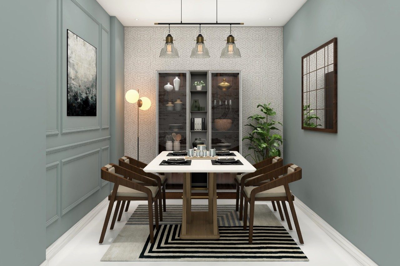 Dining room with white dining table and glass crockery unit-Beautiful Homes