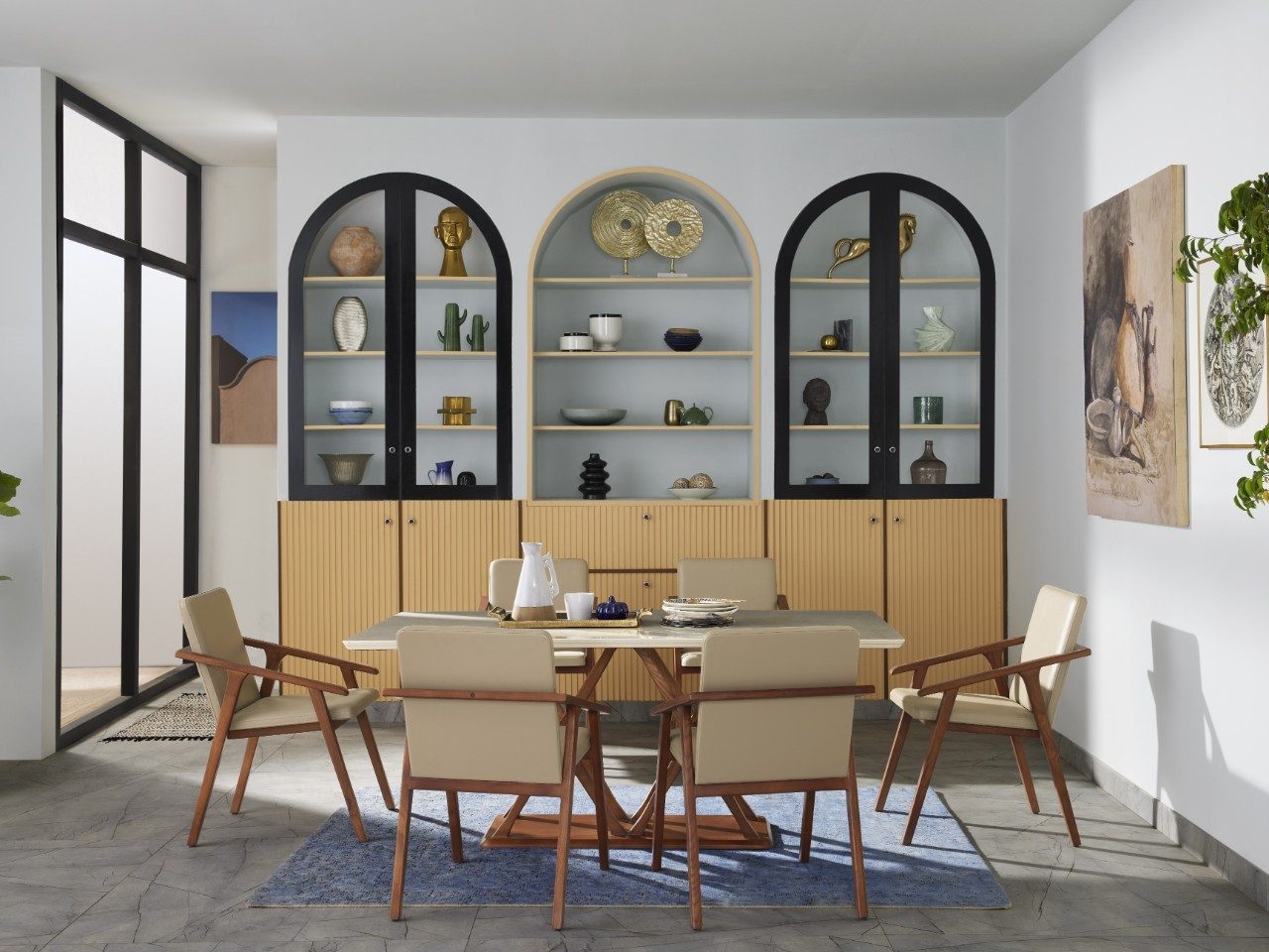 Dining room with beige chairs and grey tiles - Beautiful Homes
